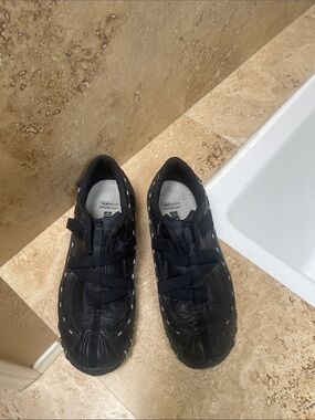 Diesel Women's Black Athletic Slip-On Sneakers with Reflective Accents